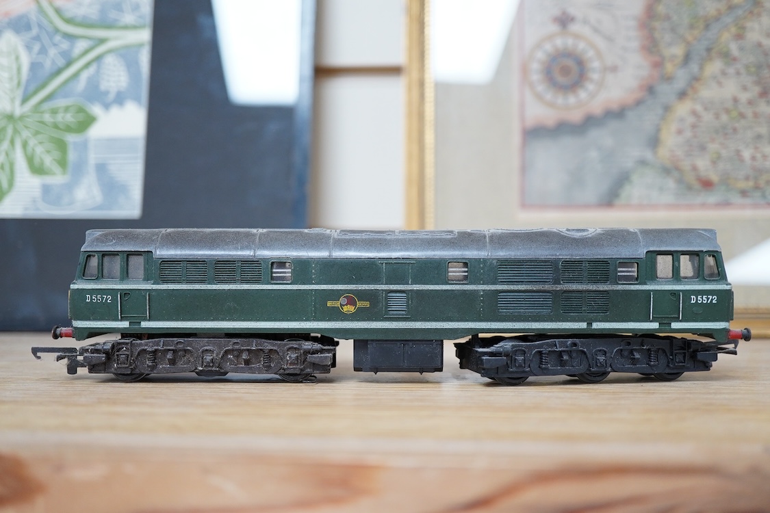 A quantity of 00 gauge railway by various makes, comprising; nine locomotives by Tri-ang, Hornby Dublo, etc. (one missing tender), sixteen maroon bogie coaches and eighteen freight wagons